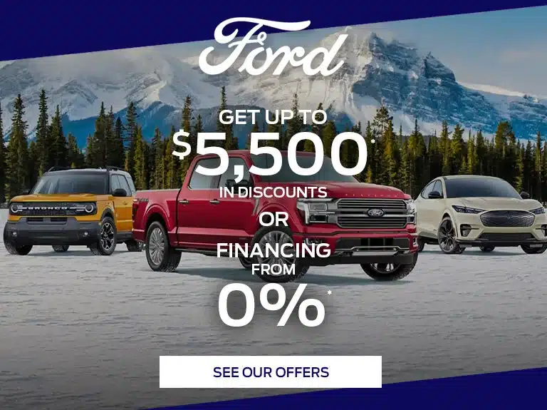 Ford vehicles in a snowy landscape with promotion text: "Up to $5,500 discounts or 0% financing."